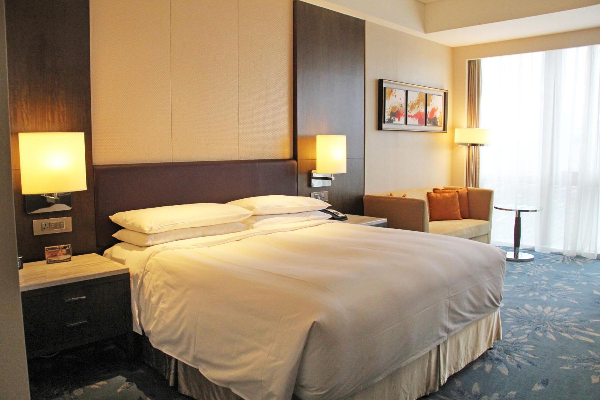 Shanghai Marriott Hotel Pudong East - Only A 30 Minute Drive From Disney Екстер'єр фото