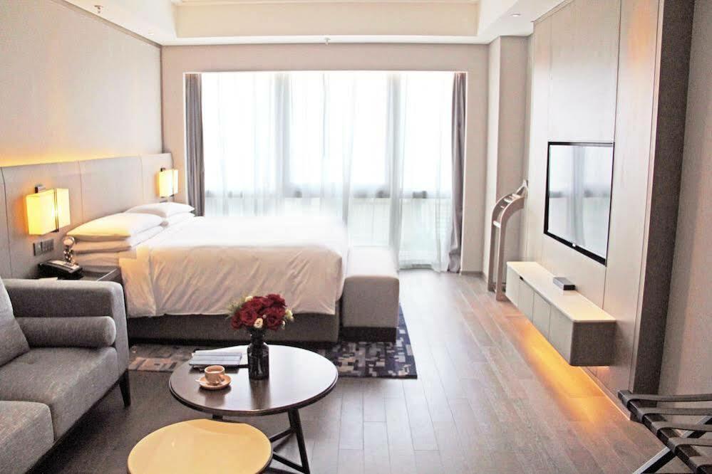 Shanghai Marriott Hotel Pudong East - Only A 30 Minute Drive From Disney Екстер'єр фото